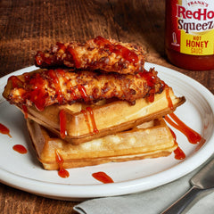 Frank's RedHot Squeeze Honey on pizza adding bold warmth