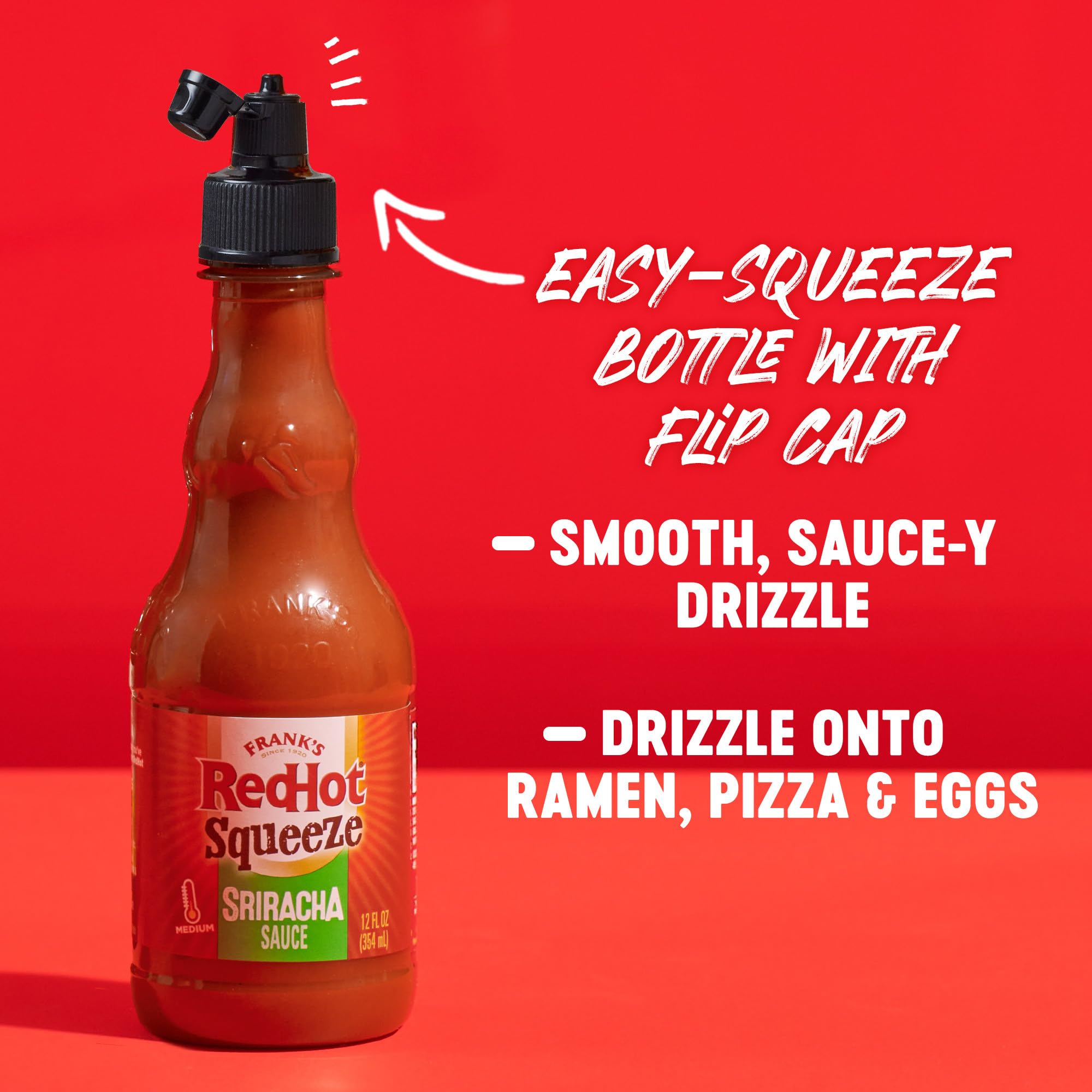 Pizza topped with Frank's RedHot Squeeze Sriracha for a zingy kick