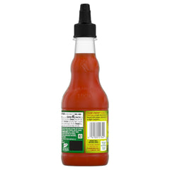 Frank's RedHot Sriracha bottle on table ready for table-top spice