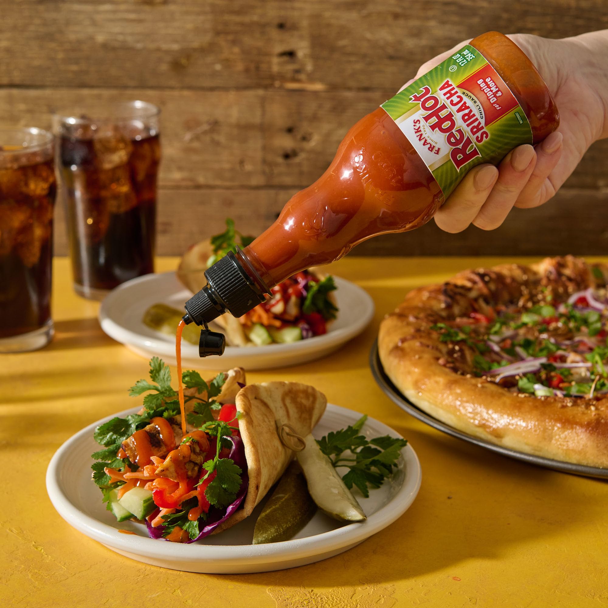 Frank's RedHot Sriracha on buffalo wings elevates spice level