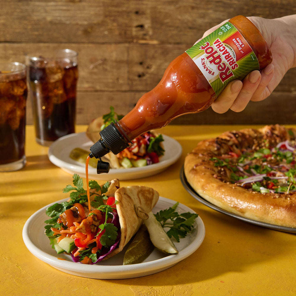 Frank's RedHot Sriracha on buffalo wings elevates spice level
