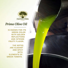 Frantoi Cutrera Primo olive oil amber glow adds warmth to a kitchen scene.