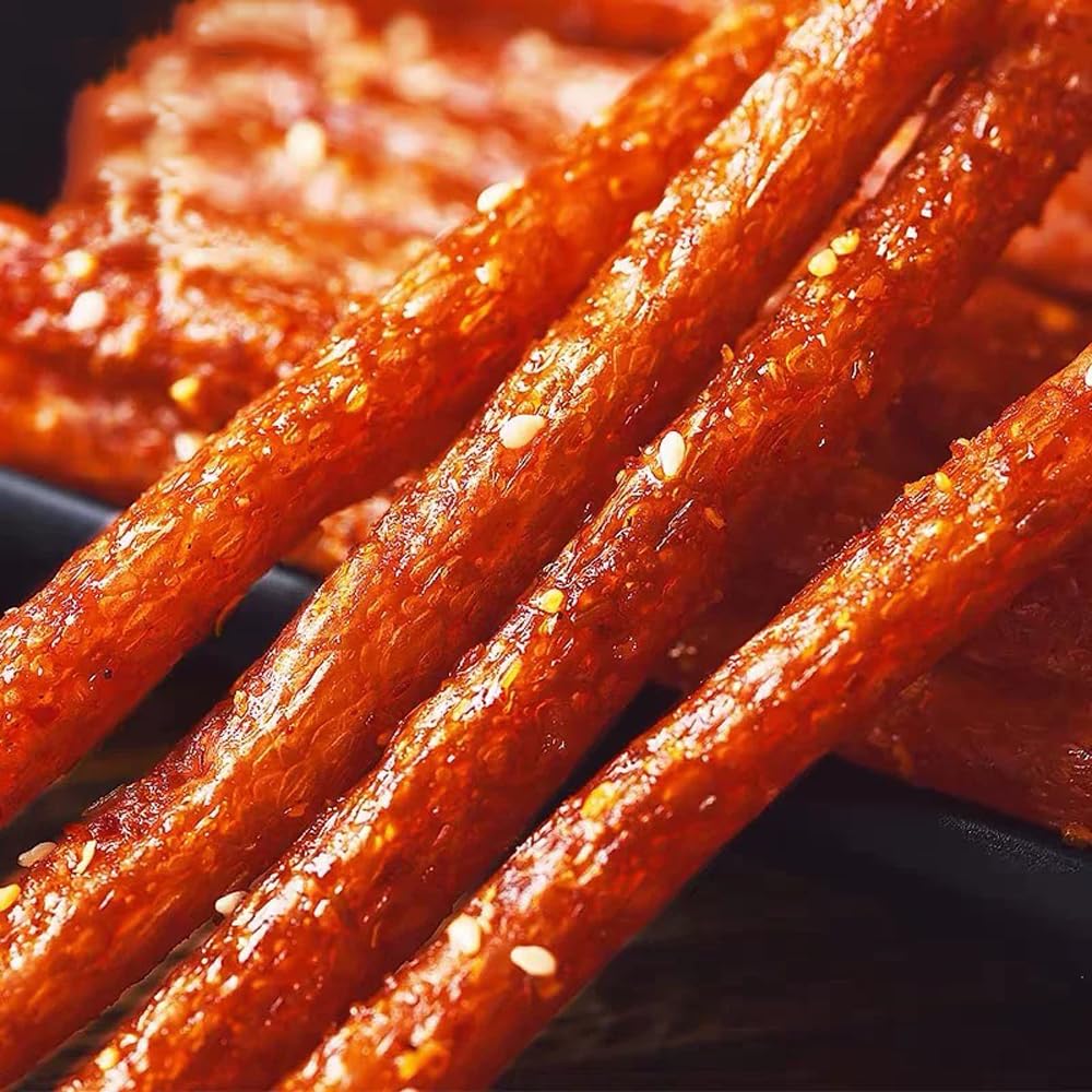 Fraunitsh spicy latiao strips texture close-up, juicy chew.