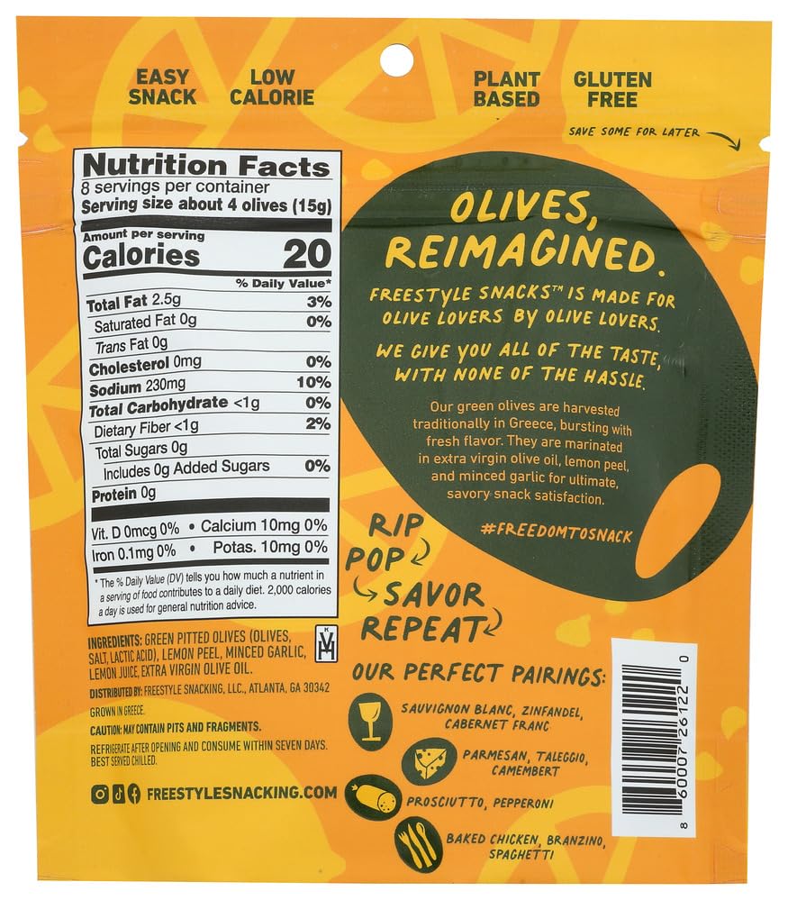 Freestyle Snacks green olives lemon garlic close-up, tangy brine with citrus notes for boards.