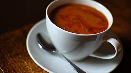 French Market Coffee & Chicory cup steaming suggests smooth sip and caramel notes.