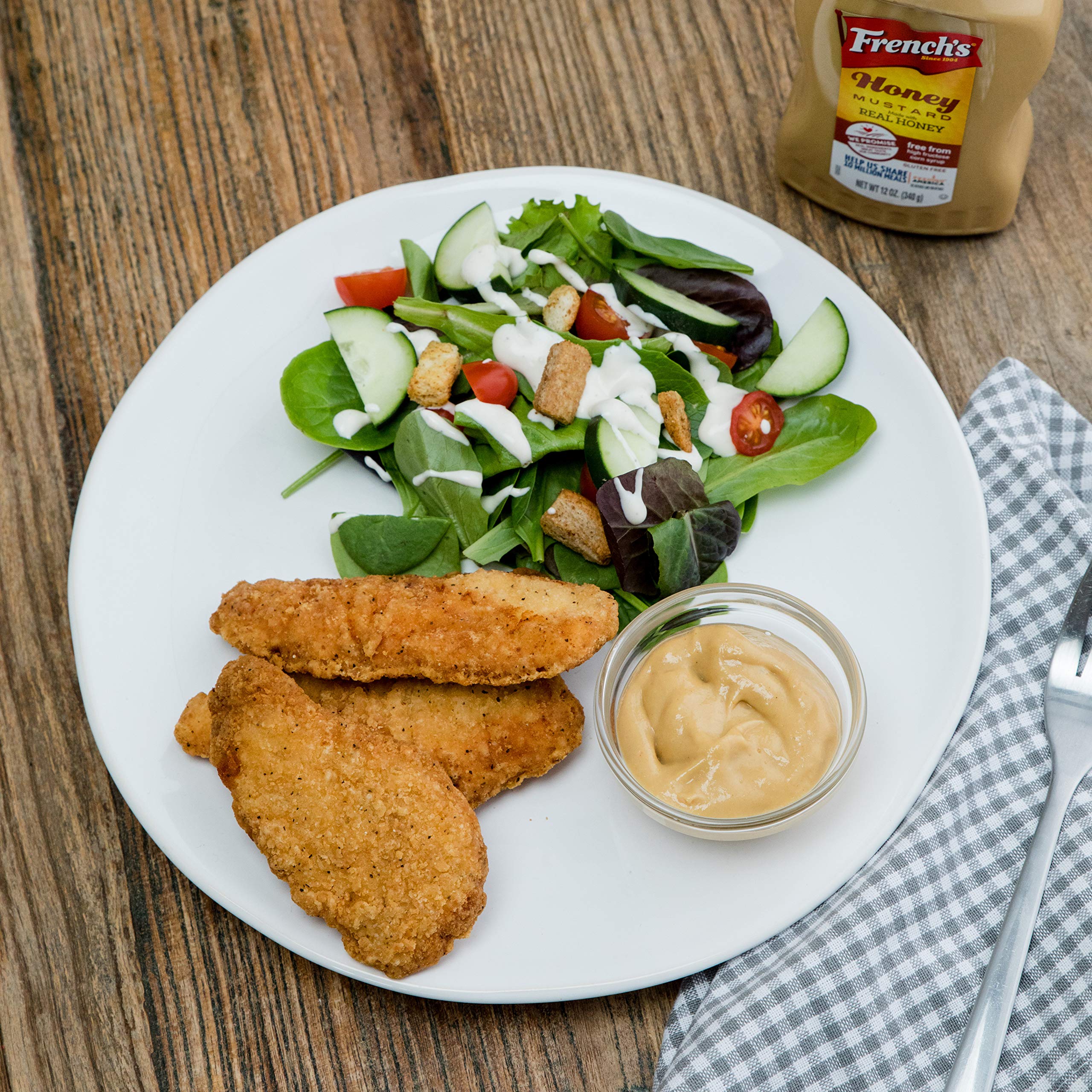 Kids enjoy a sandwich spread with French's Honey Mustard.