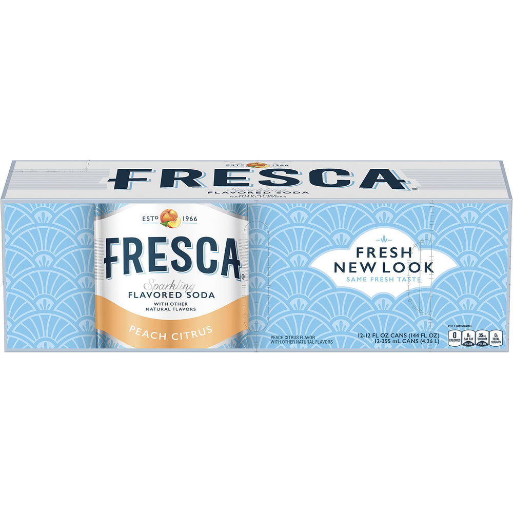 Fresca Peach Soda pouring into a chilled glass with bubbles.