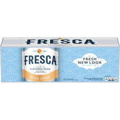Fresca Peach Soda pouring into a chilled glass with bubbles.