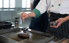 Fresh Finest pepper rub and marinade setup shows versatile kitchen use