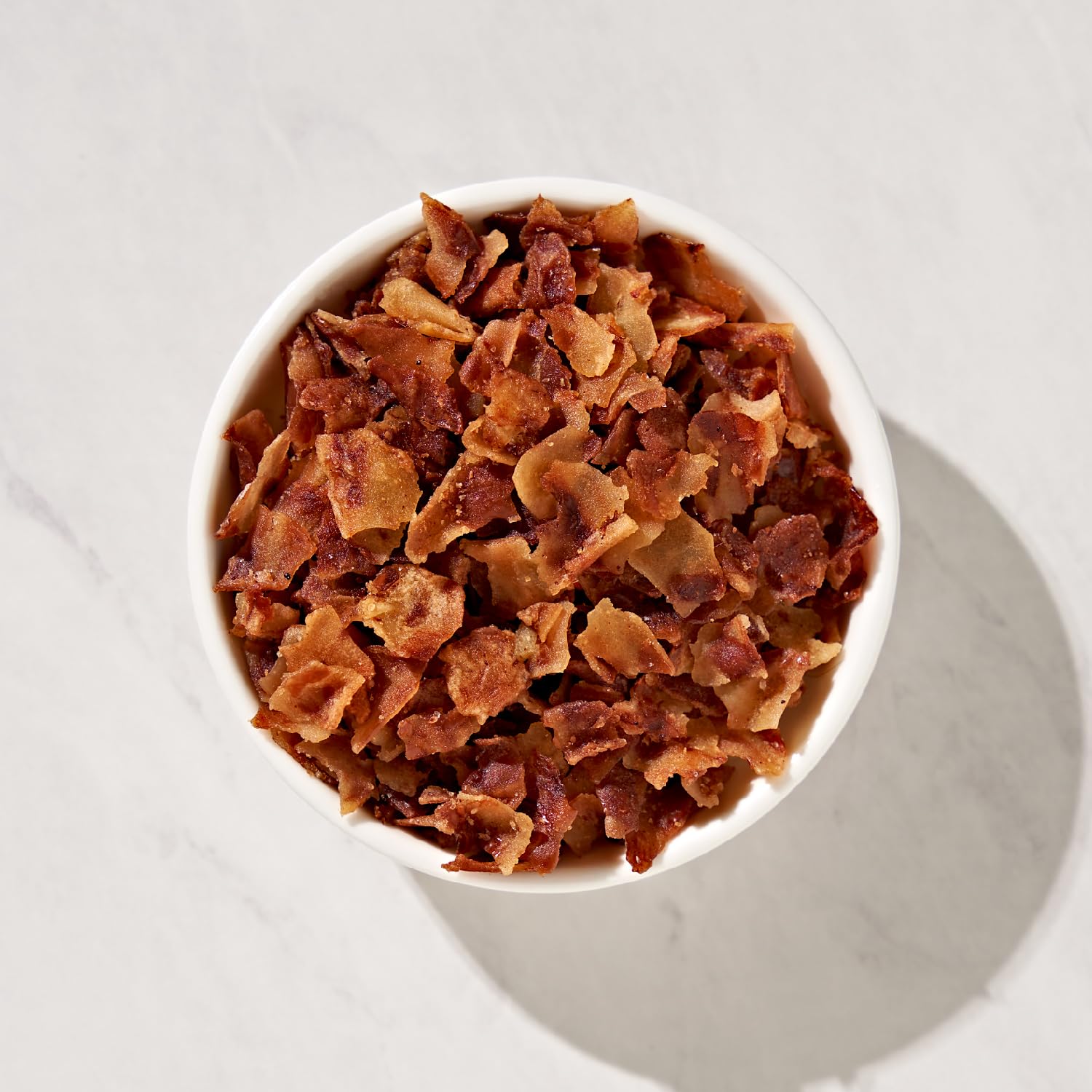 Fresh Gourmet Bacon-Less Bits on baked potatoes bring savory crunch.