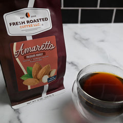 Fresh Roasted Coffee Amaretto ground coffee versatile for drip and espresso.