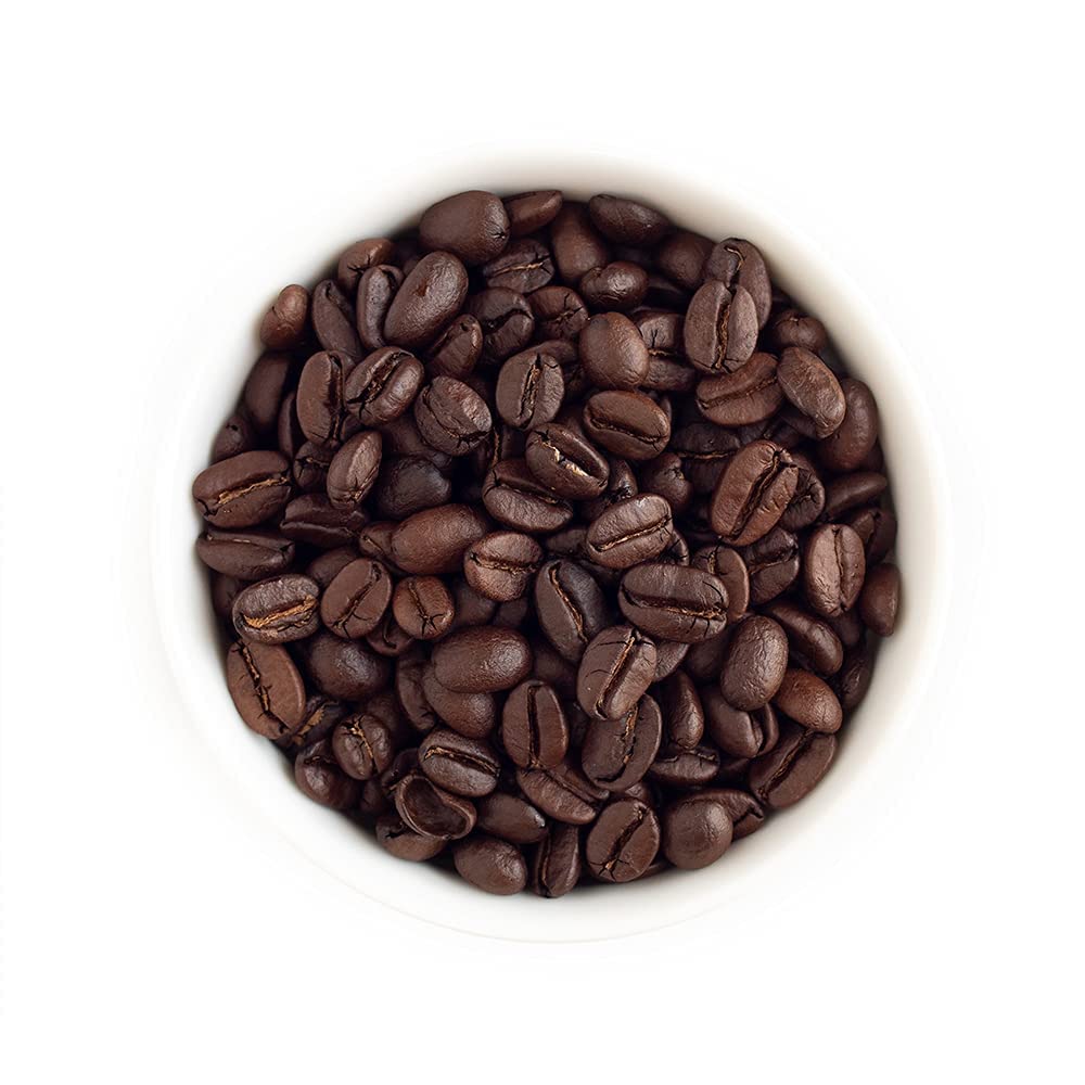Fresh Roasted Coffee dark Mexican beans closeup reveals rich color and aroma