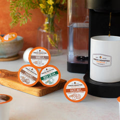 Fresh Roasted Coffee decaf caramel pods with warm, indulgent aroma for cozy moments.