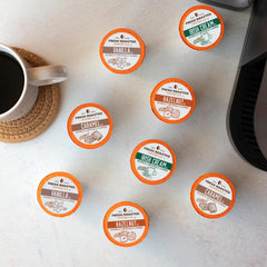 Fresh Roasted Coffee decaf hazelnut pods highlight toasted nut notes for smooth finish.