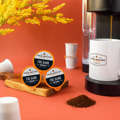 Fresh Roasted Coffee FRC Dark Roast closeup shows grounds and filters for compostability