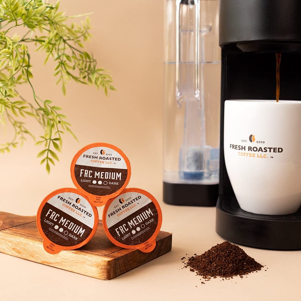 Fresh Roasted Coffee pods on shelf showing home compostable grounds and filters.
