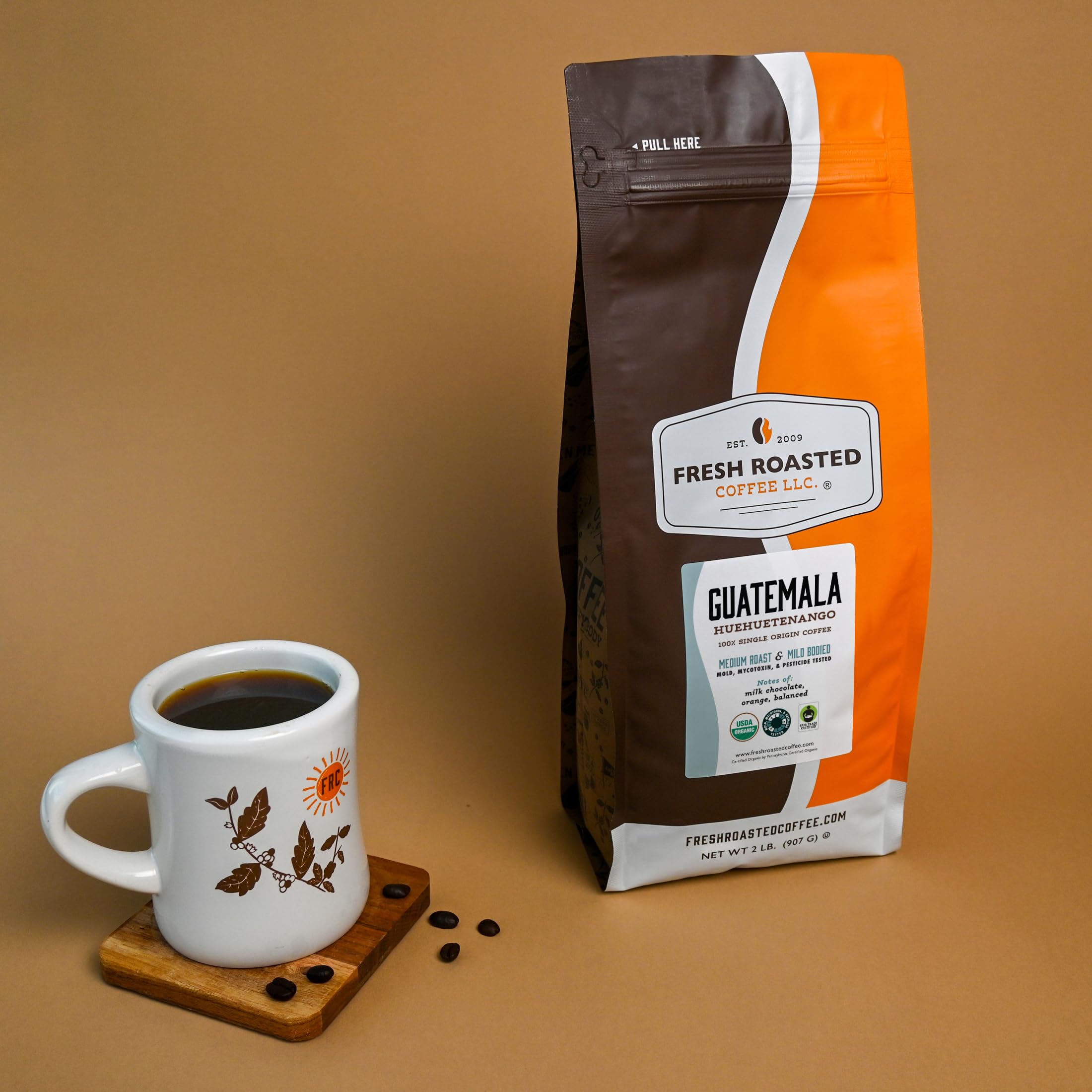 Fresh Roasted Coffee Guatemala whole beans ready for home grind.
