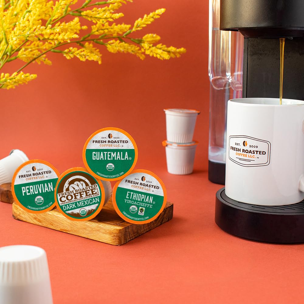 Fresh Roasted Coffee K-Cup pods close-up for easy, compatible brewing.
