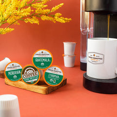 Fresh Roasted Coffee K-Cup pods close-up for easy, compatible brewing.