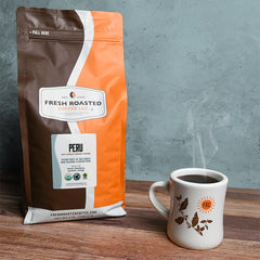 Fresh Roasted Coffee Peru fair-trade seal on packaging supporting ethical sourcing.