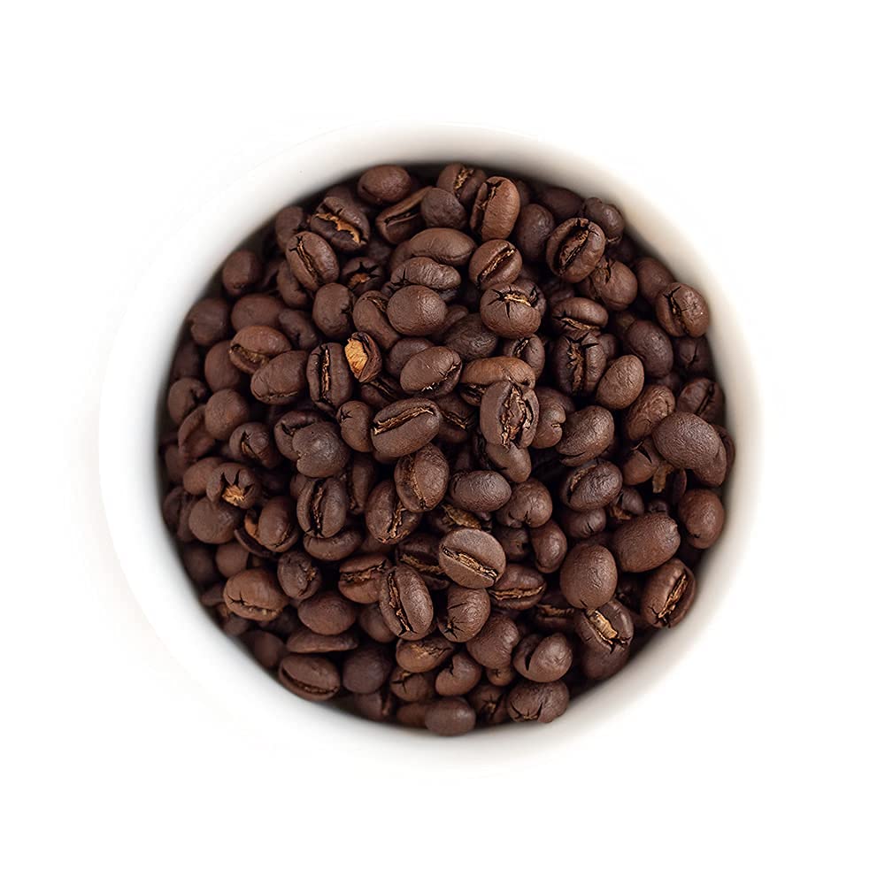 Fresh Roasted Coffee Tanzanian Peaberry whole beans close-up showing vibrant color and aroma