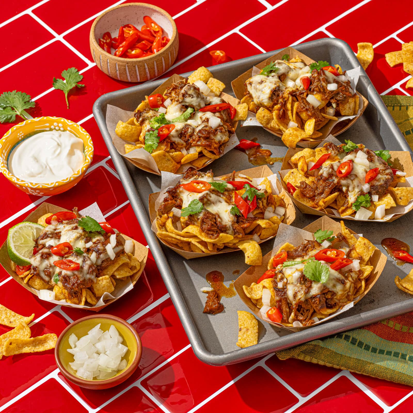 Frito-Lay Doritos Nacho Cheese, bold triangular chips for party dips.
