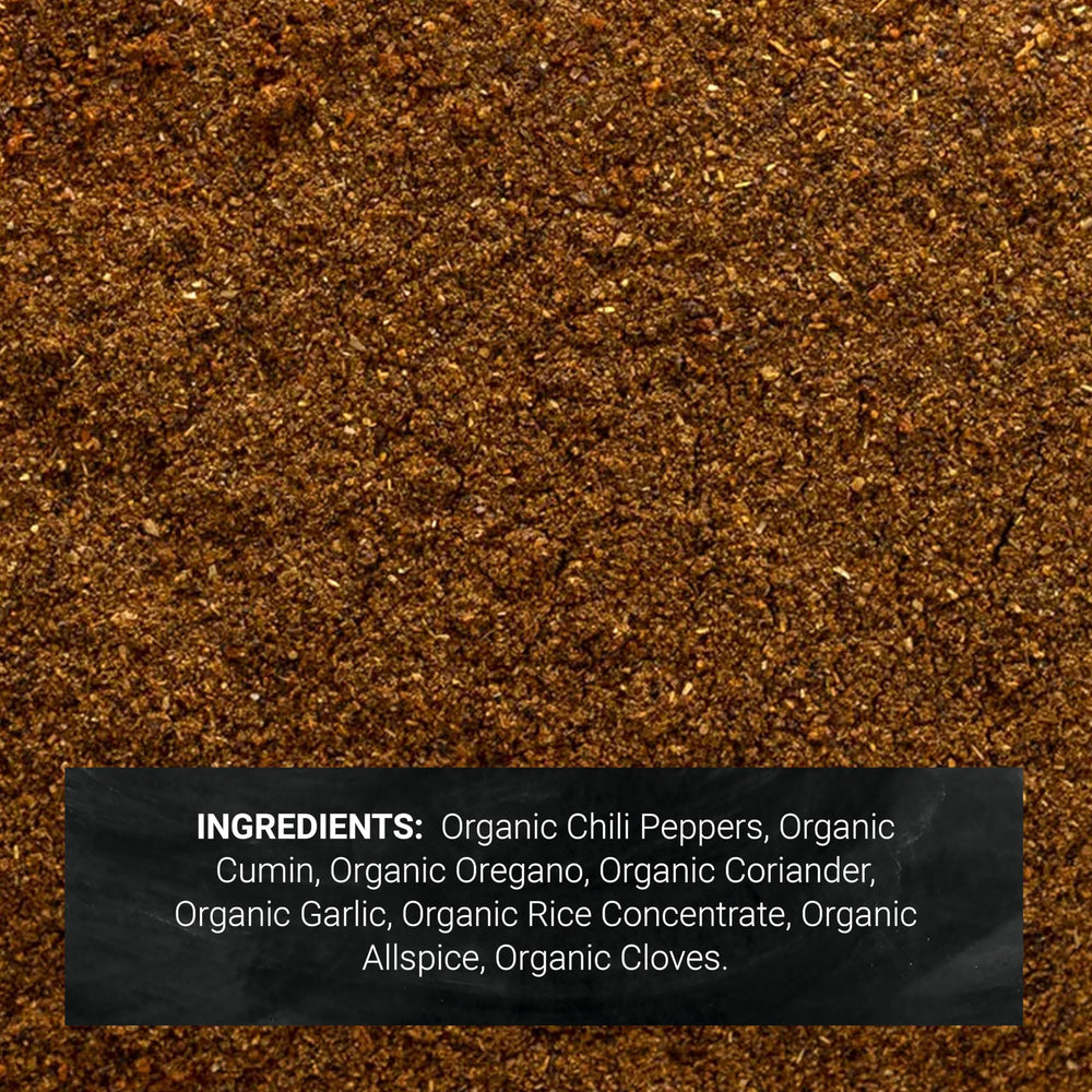Frontier Co-op chili powder seasoning over a prepared dish for depth in soups.