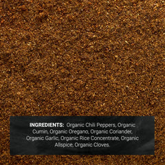 Frontier Co-op chili powder seasoning over a prepared dish for depth in soups.