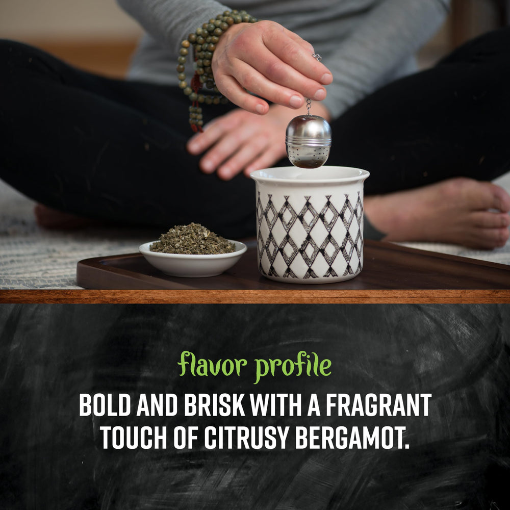 Frontier Co-op Earl Grey brewed cup steaming with citrus hints.