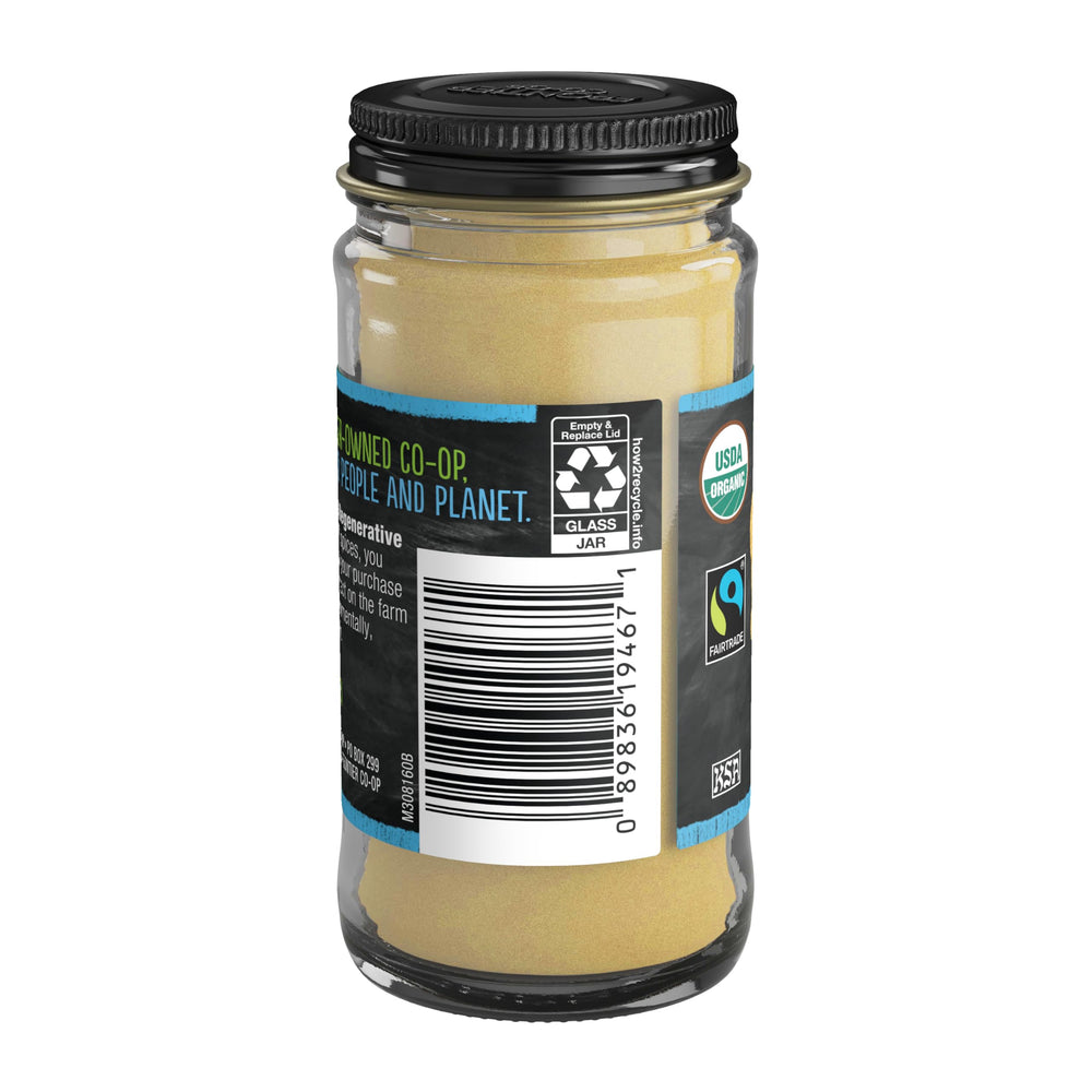 Frontier Co-op ginger root powder on a skillet scene for flavorful stir fries.