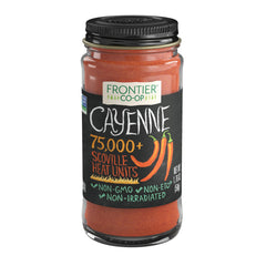 Frontier Co-op Ground Cayenne Extra Spicy bottle pour highlights bold heat for chili blends.