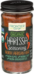 Frontier Co-op Harissa Seasoning bottle close-up showing bold North African heat for dishes.