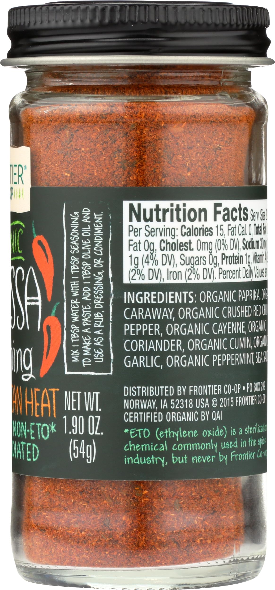 Frontier Co-op Harissa Seasoning grill-ready spice on sizzling meat.