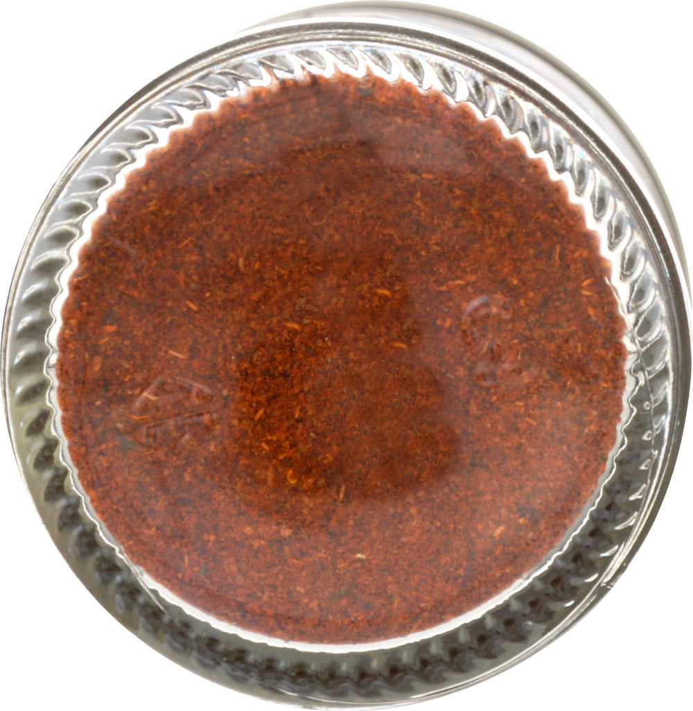 Frontier Co-op Harissa Seasoning organic and non-GMO seal close-up.
