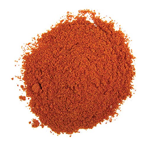 Frontier Co-op Organic Cayenne Chili Pepper Powder in a jar adds heat to soups and stews.