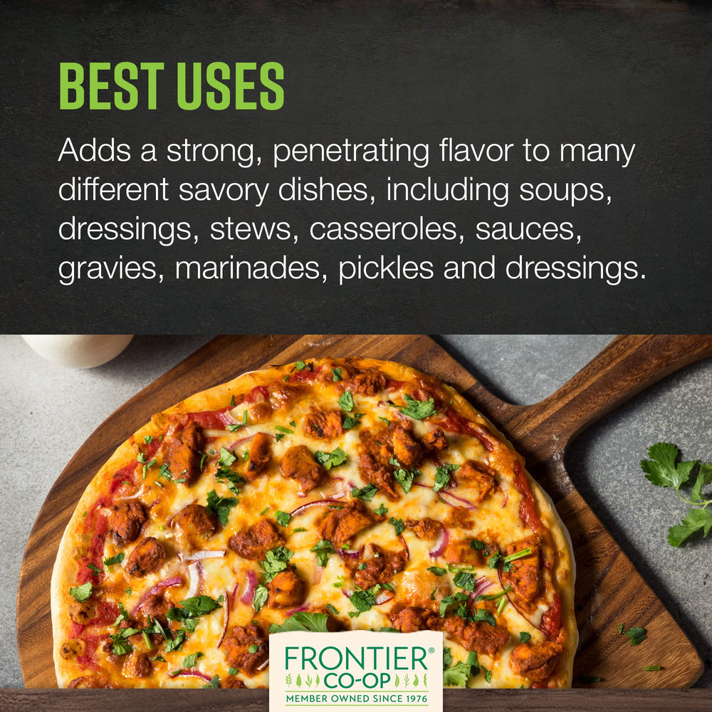 Garlic powder poured over a dish to boost flavor