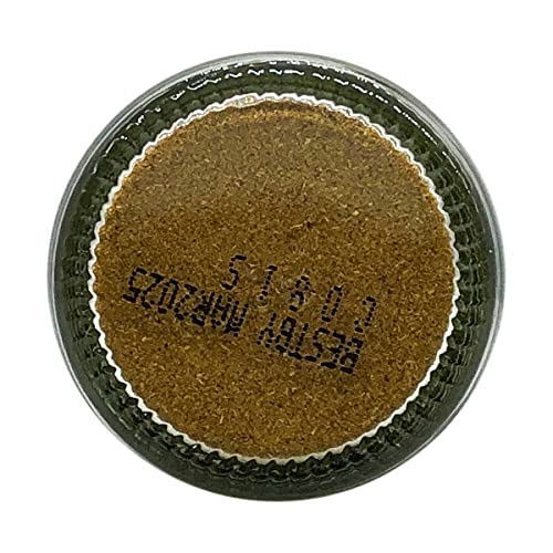 Frontier Co-op organic ground cumin powder in a measuring spoon.