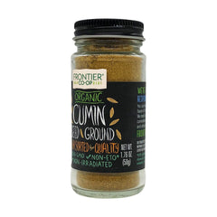 Close-up of Frontier Co-op organic ground cumin powder showing warm brown color.