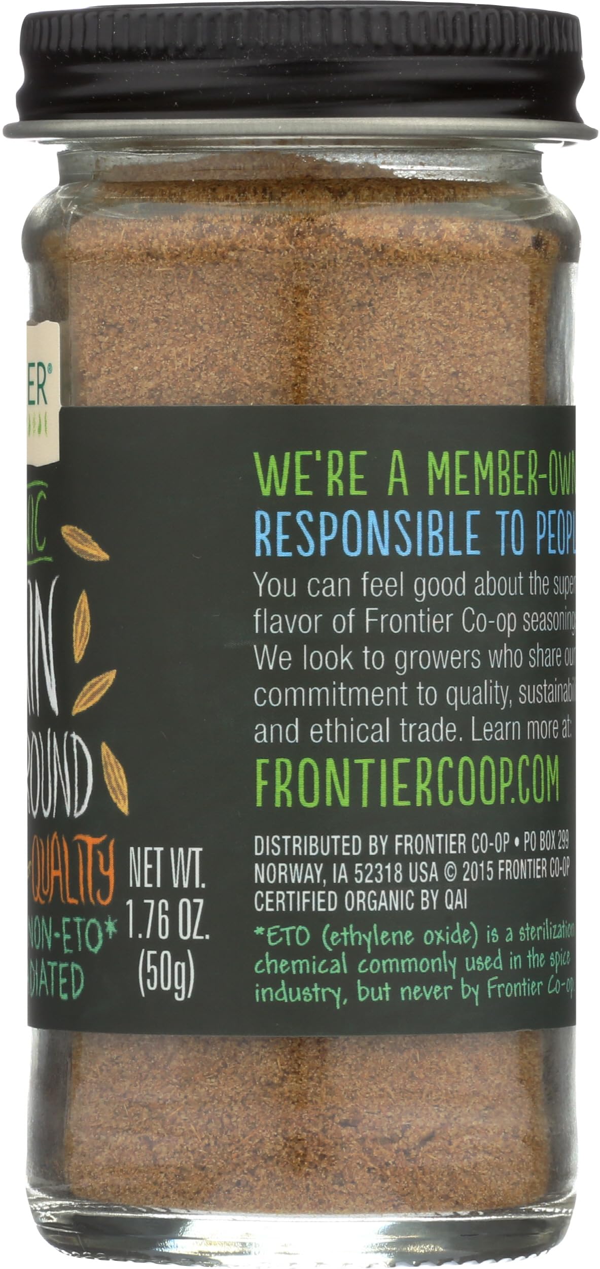 Frontier Co-op organic ground cumin in a small spice tin with label.