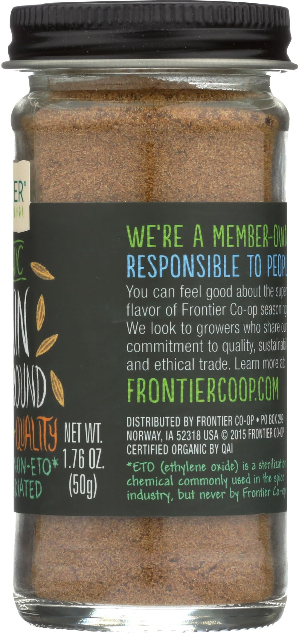 Frontier Co-op organic ground cumin in a small spice tin with label.