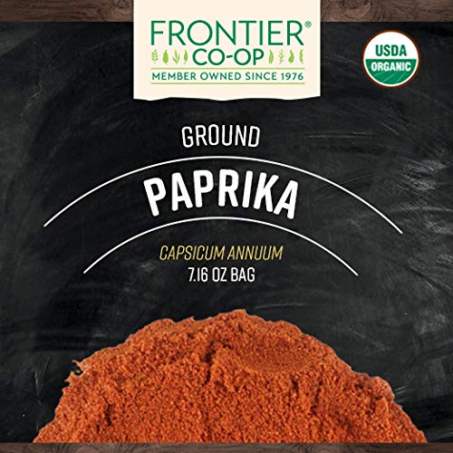 Close-up of Frontier Co-op paprika powder showing vibrant color and texture.
