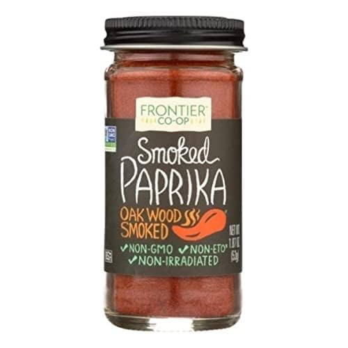 Frontier Co-op smoked paprika dusting grilled steak rub, enhancing heat and aroma.