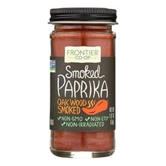 Frontier Co-op smoked paprika dusting grilled steak rub, enhancing heat and aroma.