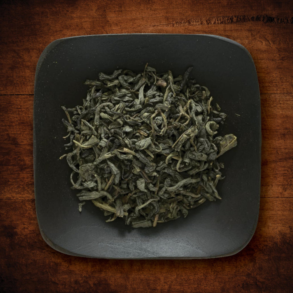 Frontier Co-op Jasmine Green Tea brewed cup shows bright aroma, perfect for daily ritual.