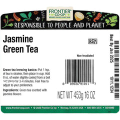 Frontier Co-op Jasmine Green Tea leaves layered with jasmine flowers for fragrant aroma.