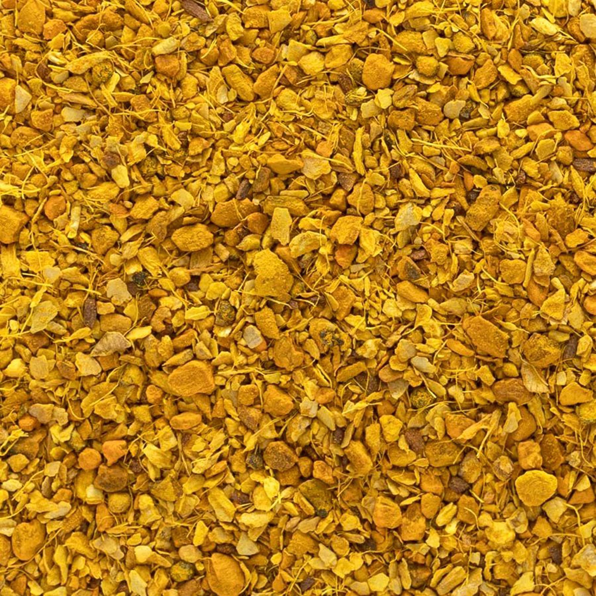 Frontier Co-op turmeric-ginger tea in cup with soothing aroma.