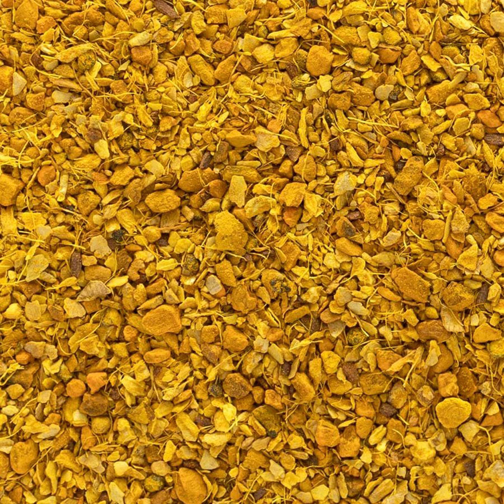 Frontier Co-op turmeric-ginger tea in cup with soothing aroma.