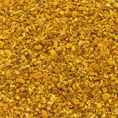 Frontier Co-op turmeric-ginger tea in cup with soothing aroma.