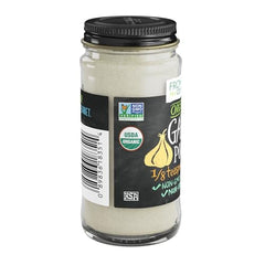 Frontier Co-op garlic powder bottle being poured for easy pasta seasoning.