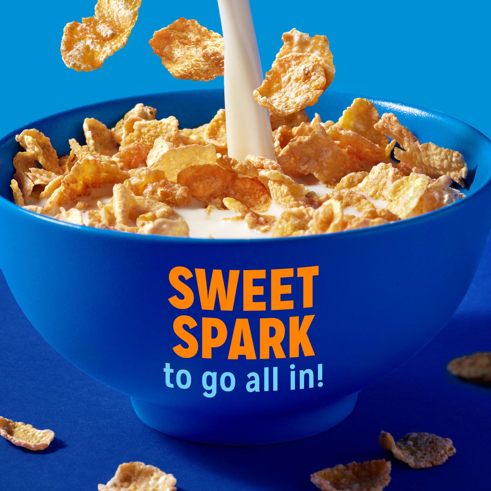 Toasted Frosted Flakes with frosting detail in a snack-ready bowl